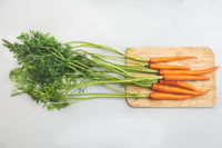 Image of carrots on a cutting board