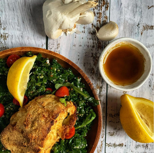 Image of healthy chicken and kale salad with lemon